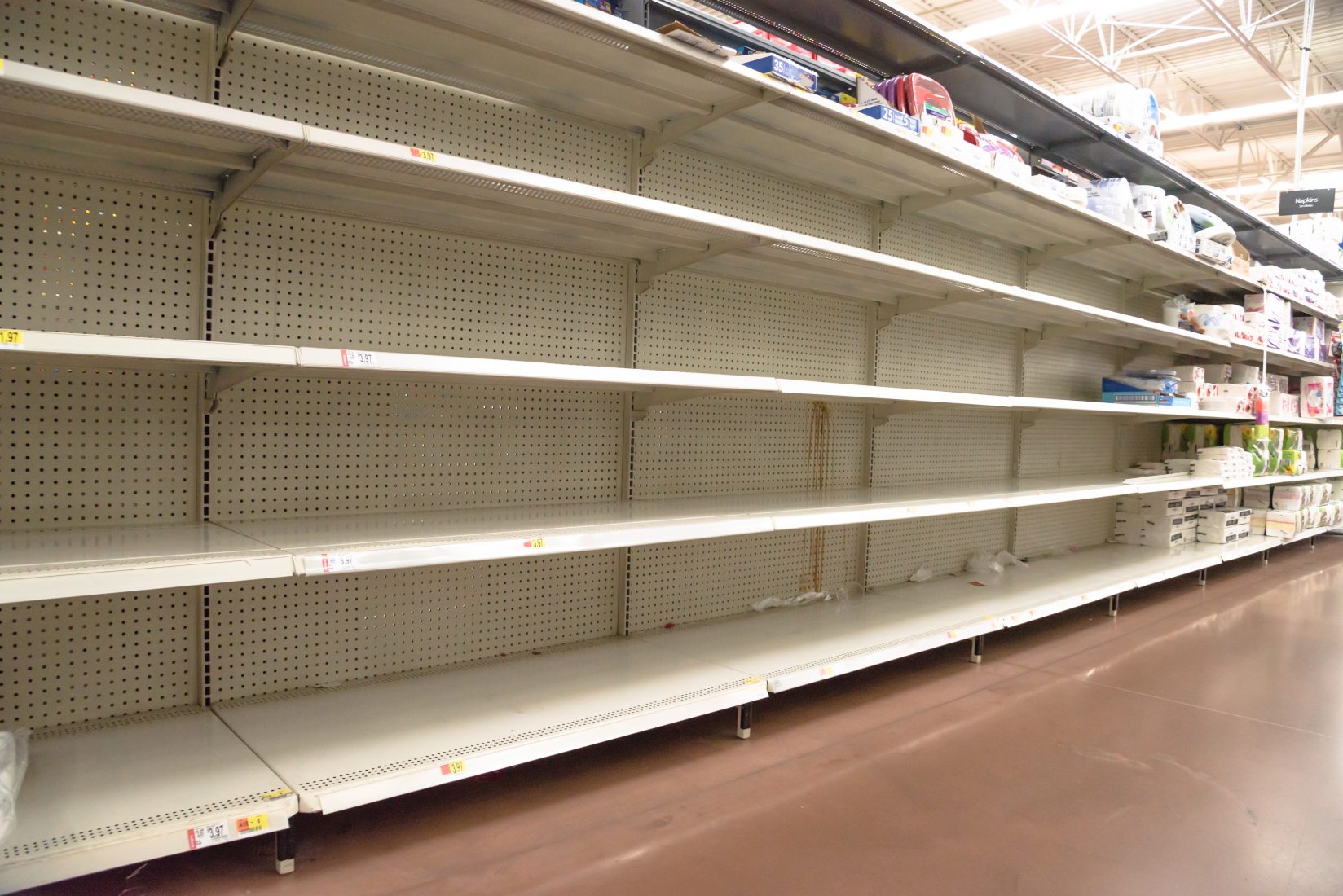 Empty shelves in store in Humble, Texas USA. Supermarket with empty